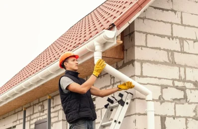 Pose et remplacement de gouttières à Perrex